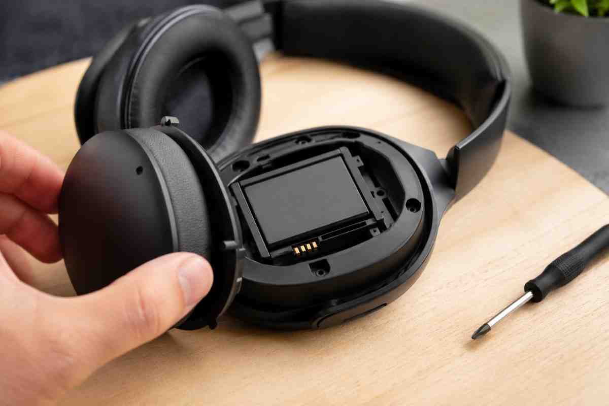Marshall Milton A.N.C. Headphones: Why This $229 Launch Matters for Everyday Listeners Close-up of a wireless headphone with a removable earcup showing a replaceable battery.